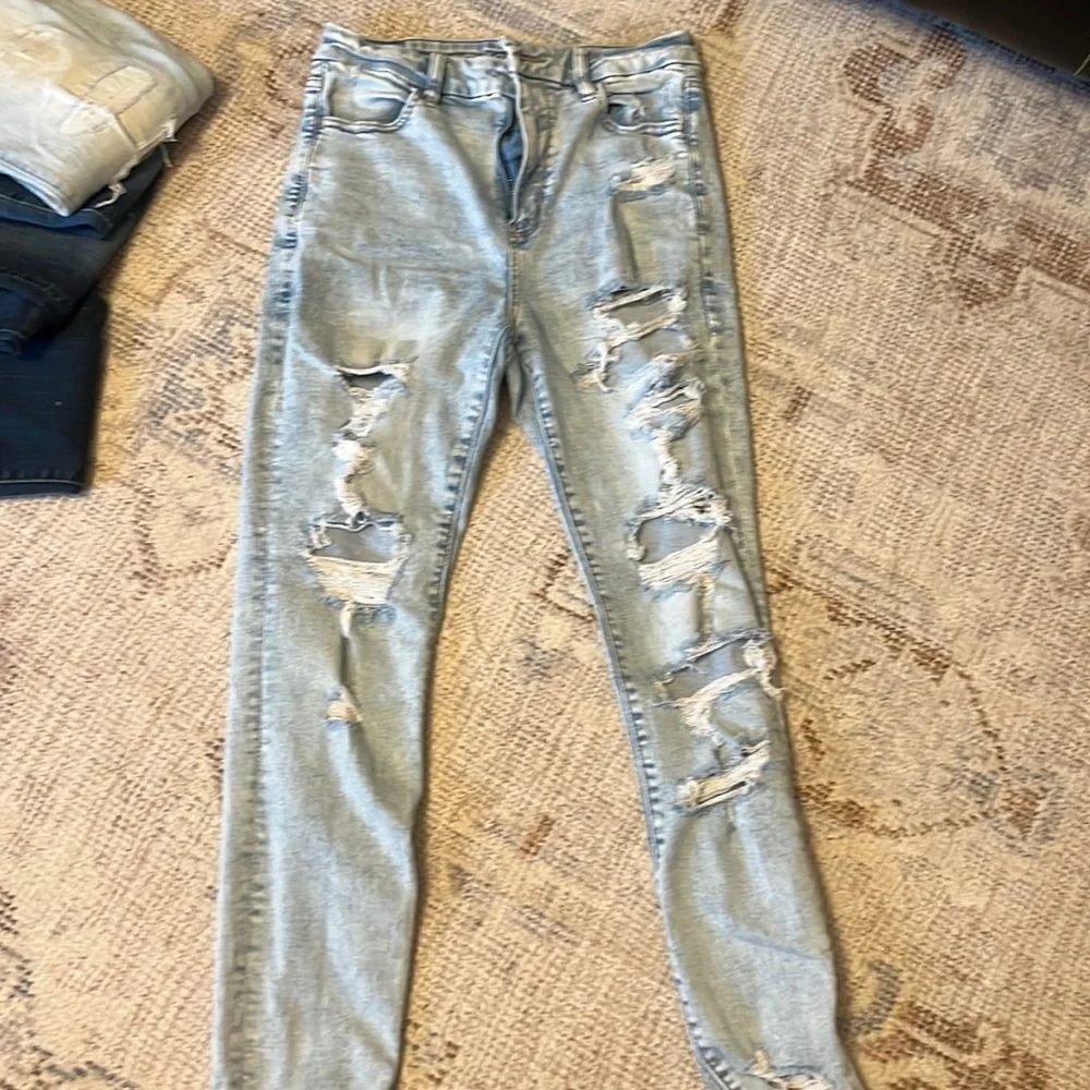 Light washed Ripped Jeans - Picture 1 of 2